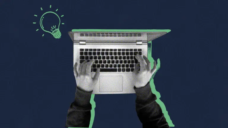 Overhead view of hands typing on a laptop with a lightbulb showing website redesign advice