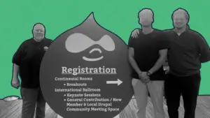 Brian, Zo, and Jesse at DrupalCon, standing with Drupal Conference sign