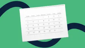 Calendar over green background with navy blue swoosh behind it.