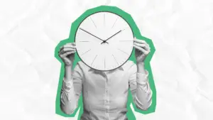 A conceptual grayscale photo of a person in a white collared shirt holding a large analog wall clock directly in front of their face. The figure is outlined with a bold green border layer against a light background with a textured, crumpled paper effect, symbolizing urgency and time constraints.